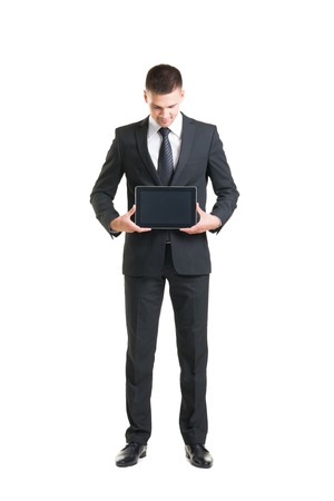 Young and confident business man. Businessman in suit isolated on white.の写真素材