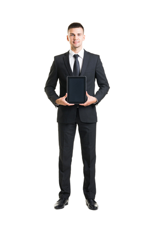Young and confident business man. Businessman in suit isolated on white.の写真素材