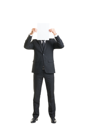 Young and confident business man. Businessman in suit isolated on white.の写真素材