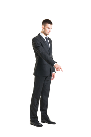 Young and confident business man. Businessman in suit isolated on white.の写真素材