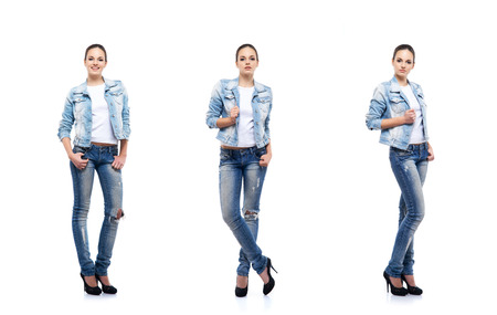 Young and beautiful teenage girl in denim jeans isolated on white. Set collection.の写真素材
