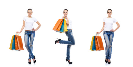 Young, attractive and happy shopping girl with bright shopping bags isolated on white. Set collection.の写真素材