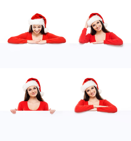 Young and attractive teenager girl with a blank billboard isolated on white background. Set collection.の写真素材