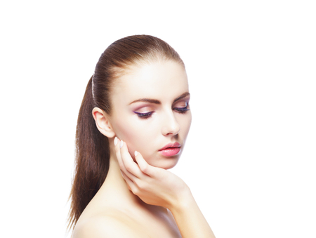 Beauty close-up portrait of beautiful, fresh and healthy girl. Human face isolated on white.の写真素材
