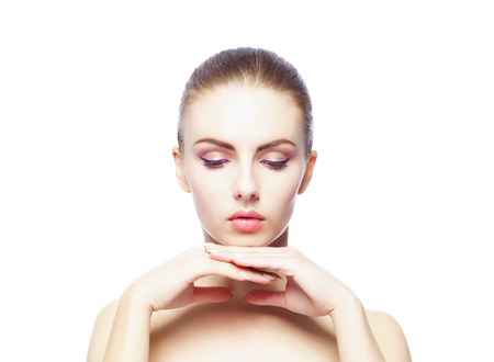 Beauty close-up portrait of beautiful, fresh and healthy girl. Human face isolated on white.の写真素材