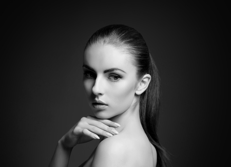 Black and white close-up portrait of beautiful, fresh and healthy girl. Human face isolated on white.の写真素材