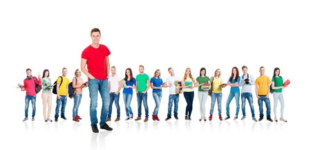 Large group of teenagers isolated on white background. Many different people standing together. School, education, college, university concept.の写真素材