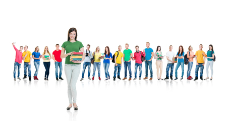 Large group of teenage students isolated on white background. Many different people standing together. School, education, college, university concept.の写真素材