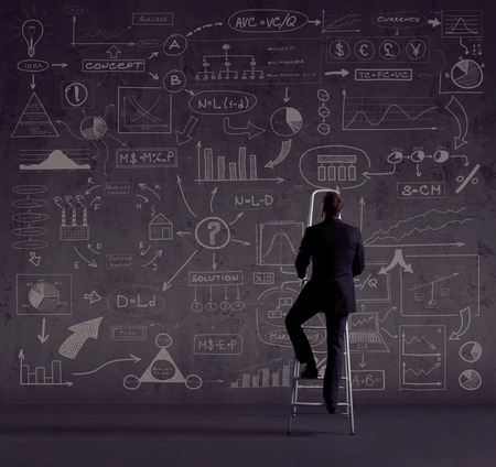 Businessman standing on stepladder. Business and office, concept.の写真素材