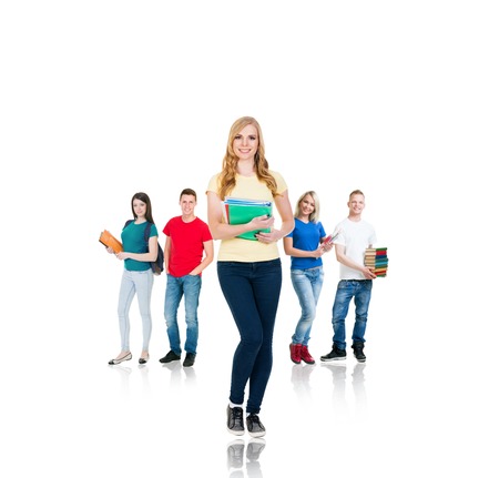 Large group of teenage students isolated on white background. Many different people standing together. School, education, college, university concept.の写真素材