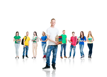 Large group of teenage students isolated on white background. Many different people standing together. School, education, college, university concept.の写真素材