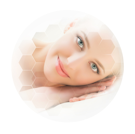 Beautiful and healthy blond woman getting massage treatment in spa salon.の写真素材