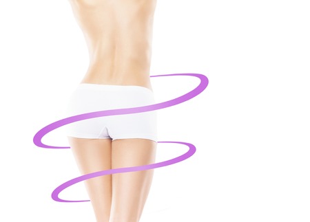 Fit and sporty girl in white underwear. Healthy life-style concept.の写真素材
