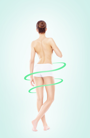 Fit and sporty girl in white underwear. Healthy life-style concept.の写真素材