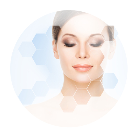 Beautiful face of young and healthy woman. Plastic surgery, skin care, cosmetics and face lifting concept.の写真素材