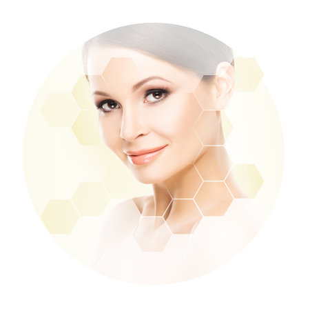 Beautiful face of young and healthy woman. Plastic surgery, skin care, cosmetics and face lifting concept.の写真素材