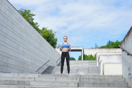 Young, fit and sporty woman. Fitness, sport, urban and healthy lifestyle concept.の写真素材