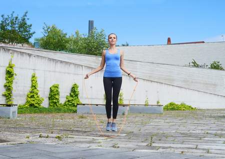 Young, fit and sporty woman. Fitness, sport, urban and healthy lifestyle concept.の写真素材