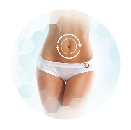 Healthcare, dieting, sport and beauty concept. Beautiful female body. Woman in white swimsuit.の写真素材