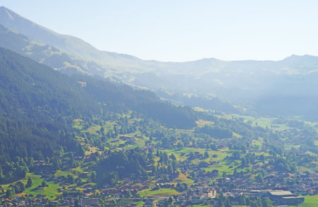 Alpine peaks of Grindelwald and Jungfrau. Landskape background of Bernese highland. Alps, tourism,...