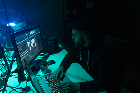 Hackers making cryptocurrency fraud using virus software and computer interface. Blockchain cyberattack, ddos and malware concept. Underground background.の写真素材