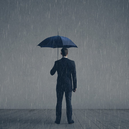 Businessman in formalwear over dark background. Business, finance, career and office concept.の写真素材