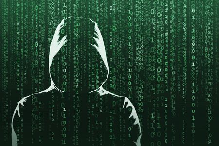 Anonymous computer hacker over abstract digital background. Obscured dark face in mask and hood. Data thief, internet attack, darknet fraud, dangerous viruses and cyber security.の写真素材