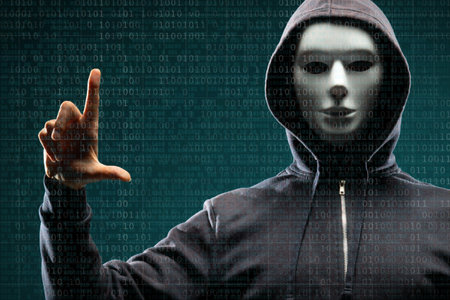 Anonymous computer hacker over abstract digital background. Obscured dark face in mask and hood....