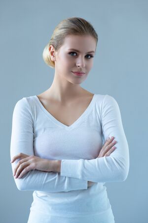 Portrait of young and natural woman. Face of attractive smiling lady. Day light.の写真素材
