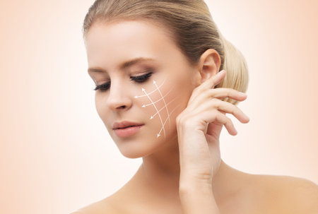 Close-up portrait of young, beautiful and healthy woman ready for plastic surgery treatment.