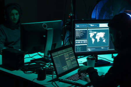 Hackers making cryptocurrency fraud using virus software and computer interface. Blockchain cyberattack, ddos and malware concept. Underground background.の写真素材