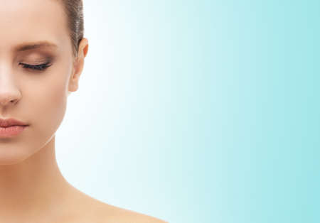 Face of a beautifyl girl. Plastic surgery, skin lifting and cosmetics concepts.の写真素材