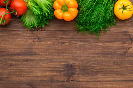 Healthy eating ingredients: fresh vegetables, fruits and superfood. Wooden backgroundの写真素材