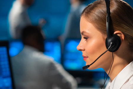 Diverse team of brokers workin in office using workstation and analysis technology. Workplace of professional traders. Global financial markets, business strategy, currency exchange and banking.の写真素材