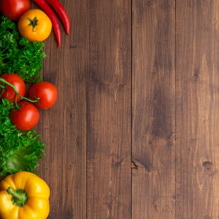 Selection of fresh products for preparing healthy and delicious vegetarian and vegan food. Various vegetables and fruits lie on the table. Flat lay.の写真素材