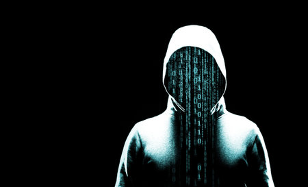 Computer hacker in hoodie. Obscured dark face. Data thief, internet fraud, darknet and cyber...