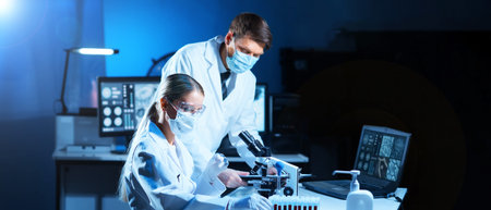 Professional Doctors Doing Monkeypox Research in a Modern Futuristic Laboratory. Lab Experiments in...