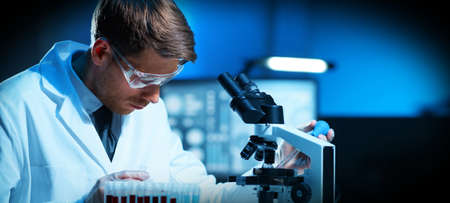 Professional Doctors Doing Monkeypox Research in a Modern Futuristic Laboratory. Lab Experiments in Clinic Hospital. Science and Medicine concept.の写真素材