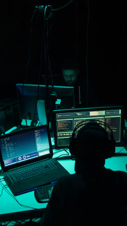 Hackers breaking server using multiple computers and infected virus ransomware. Cybercrime, technology, phishing mail concept.の写真素材