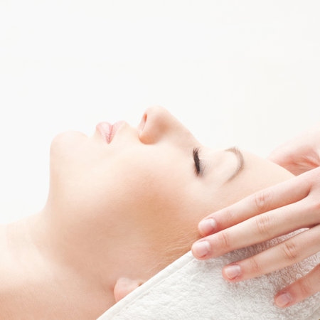 Young woman getting spa and beauty treatment. Rejuvenation and health care.の写真素材