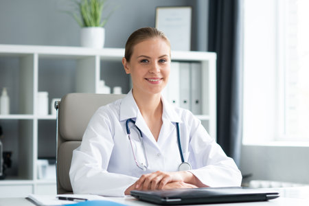 Young and professional female doctor working in a medical office. Health care and medicine concept.の写真素材