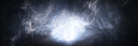 Abstract smoke texture over black background. Fog in the darkness.の写真素材
