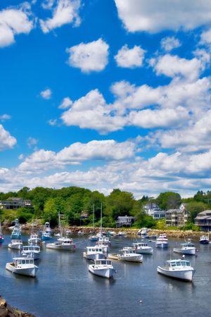 Boats at anchor in Perkin's Cove in Ogunquit, Maine (USA)の写真素材