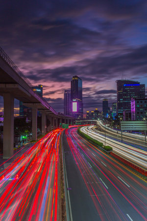 The light trails on the street in Jakartaの写真素材