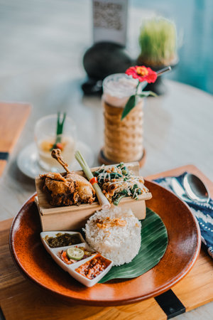 Thai food with rice and fried chicken in restaurant, stock photoの写真素材