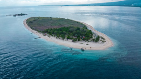 Aerial view of small island in the middle of the sea.の写真素材