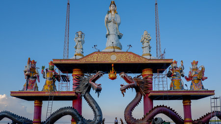 Goddess statue on blue sky background, Thailand.の写真素材