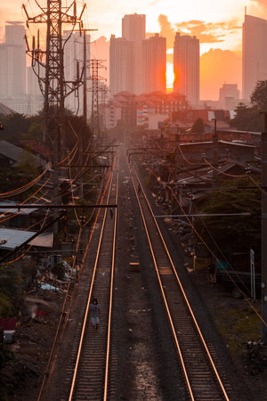 Railway in the city at sunset.