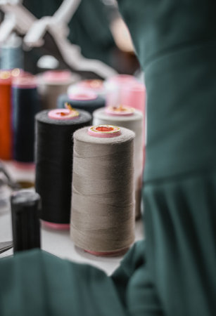 multi-colored threads in the sewing fabric