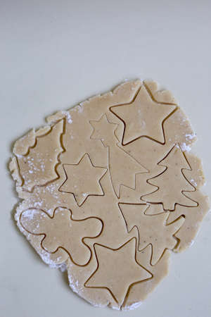 Baking Christmas cookies. Gingerbread cookie dough. Christmas cookie cuttersの写真素材